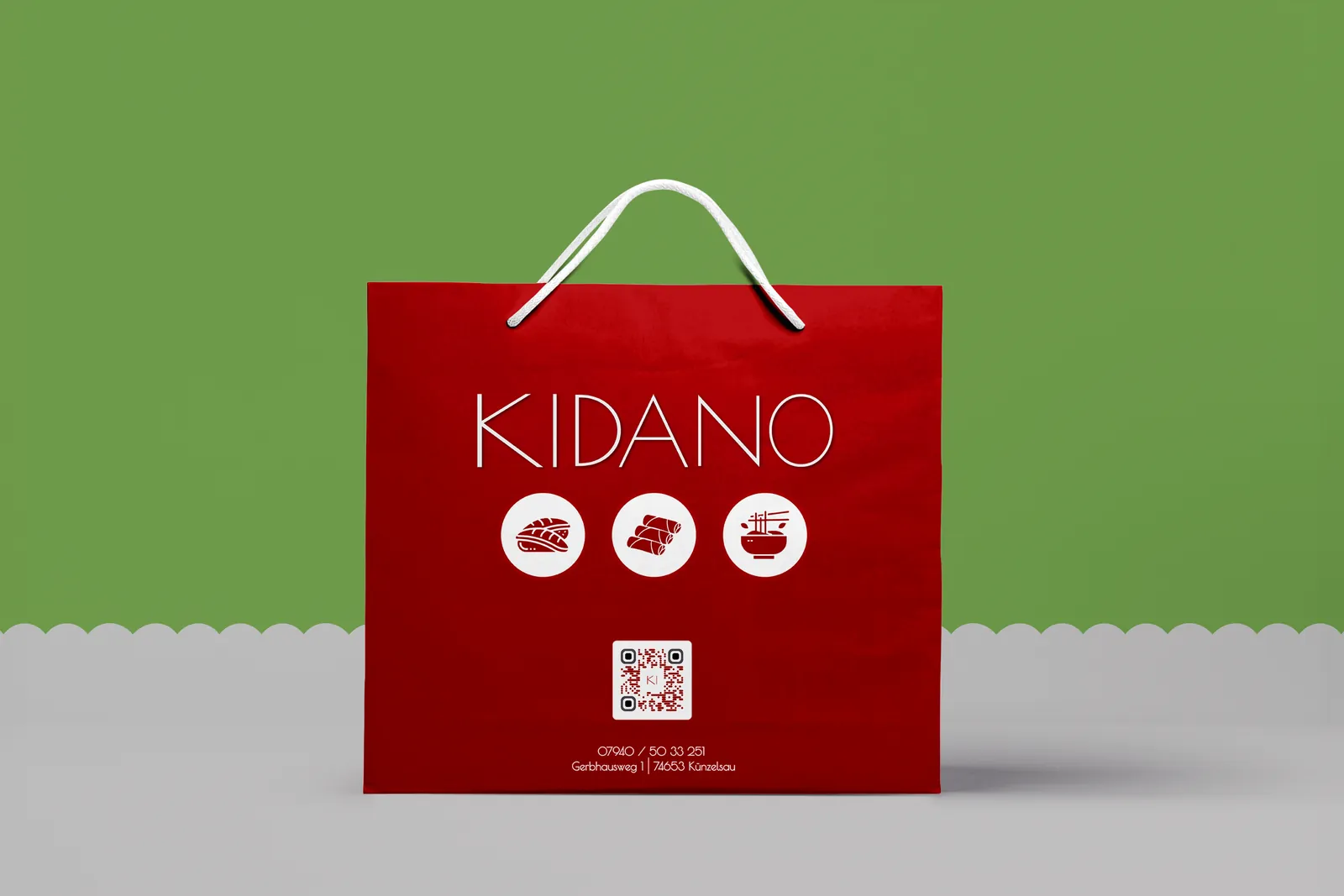 Red paper bag with logo and three icons